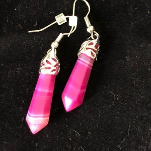Fuchsia and silver tone gemstone earrings.